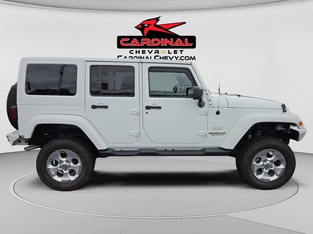 Used 2015 Jeep Wrangler Unlimited Sahara with VIN 1C4BJWEG2FL700625 for sale in Hurricane, WV